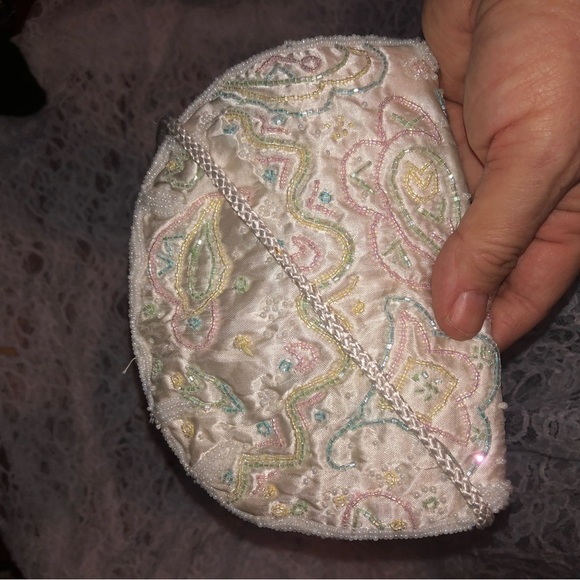 Cream Clutch with Intricate Paisley Pattern and Textured Finish - Picture 3 of 4